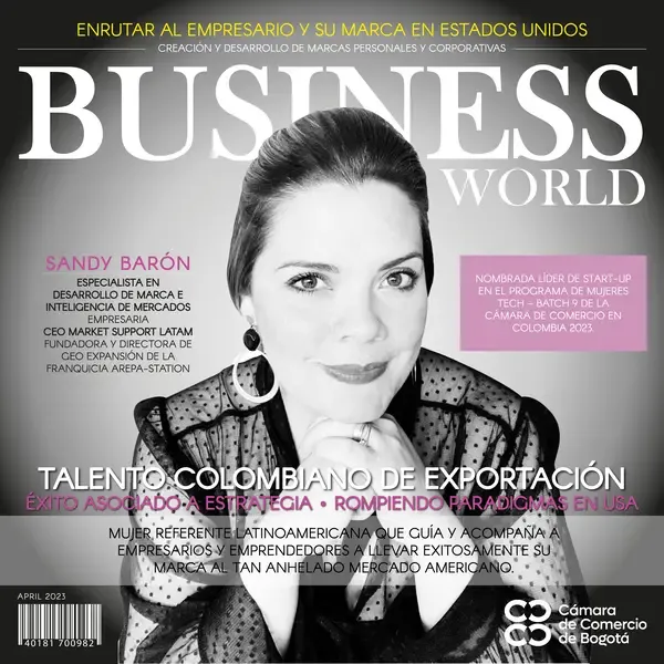 Colombian Chamber of Commerce magazine cover featuring Sandy as the lead subject, with a "business" sign behind her